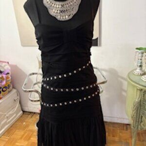 Black dress with tulle hem and snap embellishments